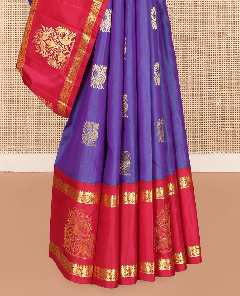 Violet Kanchipuram Silk Saree, Enthralled with Mayil Buttas on Its Body, Complemented by Contrast One-Sided Border of Mayil and Chakram Designs, Pallu Features Floral Designs, and Comes Without a Blouse