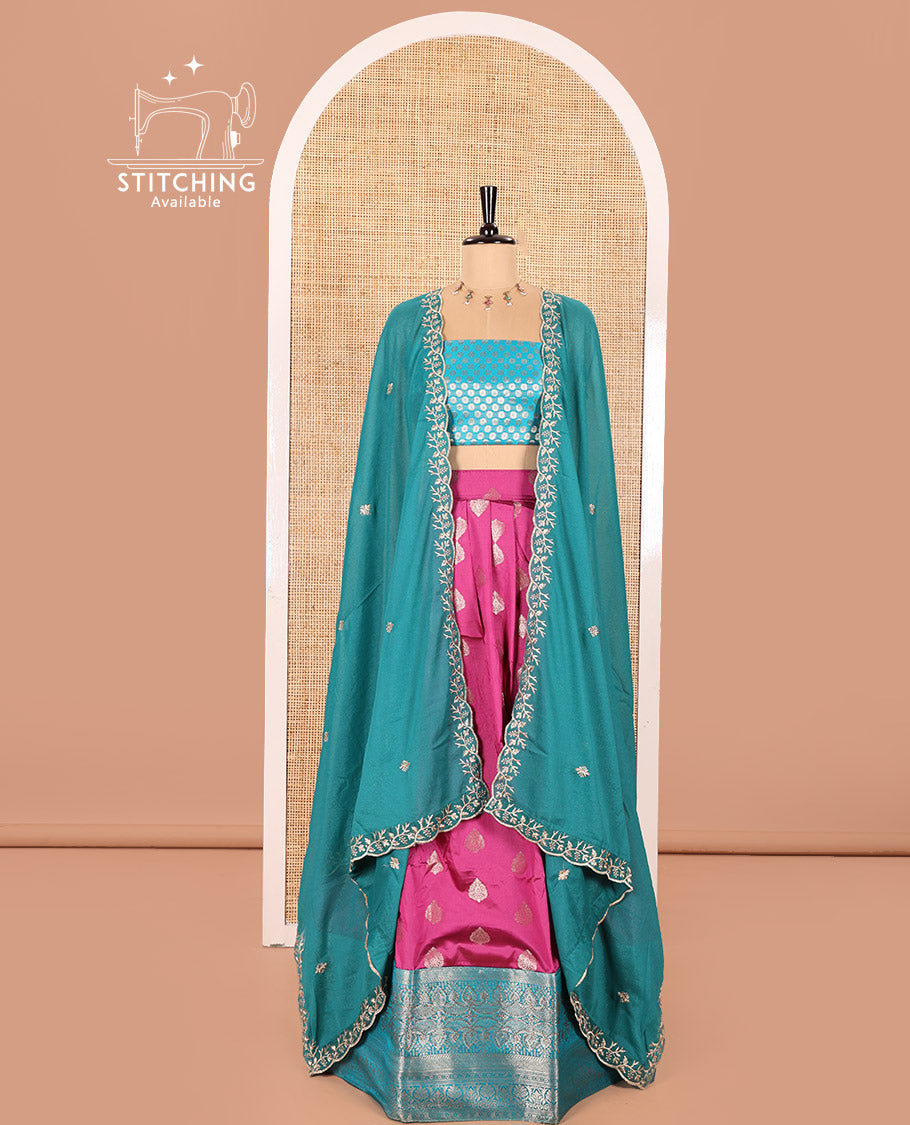 Rani Pink and Ferozi Color Semi-Banaras Silk Half-Saree Featuring Zari  Buttas All Over the Skirt, Highlighted with a Contrast Traditional Zari Design Border, Rudraksham Motifs Woven Blouse, and a Shimmer Georgette Scallop-Embroidered Dhavani