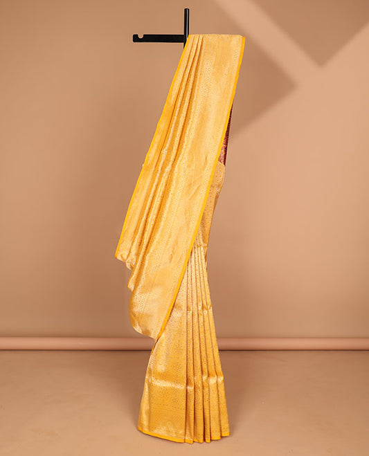 Yellow floral jacquard with self intricate zari design border & floral zari design pallu