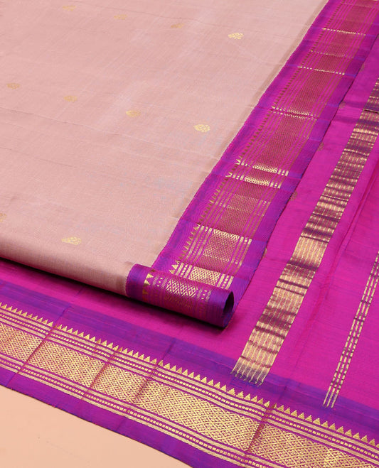 Pink Kanchipuram Silk Saree, Adorned with Zari Buttas on Its Body, Complemented by a Contrast One-Sided Korvai Border of Rekku, Banaras, Muthu, and Jaal Designs, Pallu Features Zari Designs, and Comes Without a Blouse