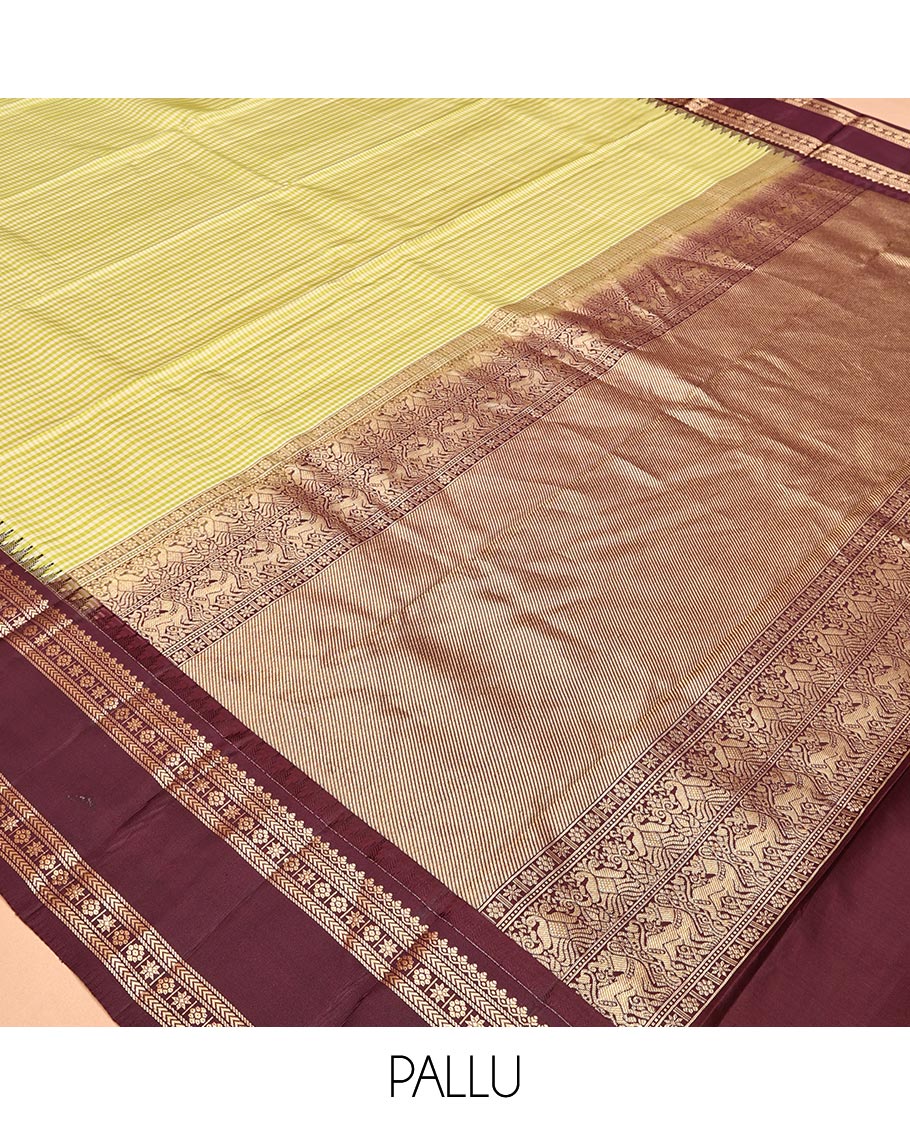 Green Vasundhara Silk Saree, Adorned with Kasa-Kasa-Style Checks, Complemented by a Contrast Rettai Pettu Border of Thazampoo Rekku, Salngai, Banaras, Kathir, Kamalam, and Star Designs, Gleaming Zari-Decked-Up Pallu and Paired with a Contrast Blouse