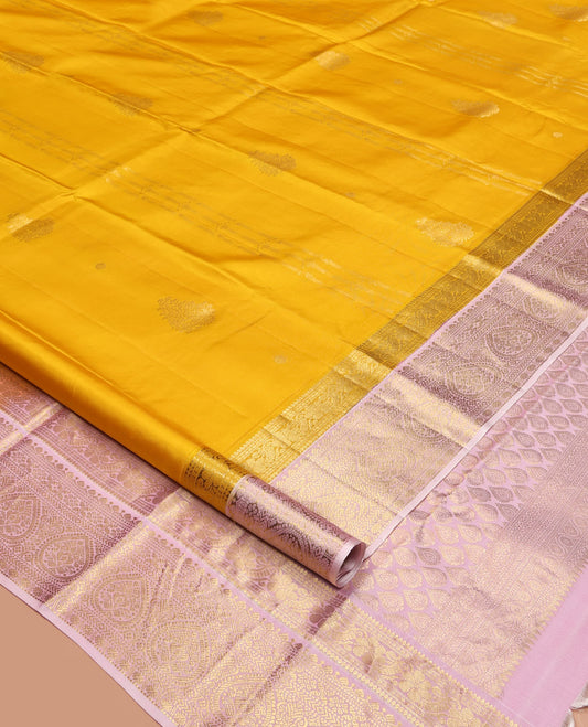 Mustard Yellow-Beach Pink Vasundhara Silk Saree, Richly Detailed with Zari Buttas, Complemented by Contrast Border of Kamalam, Muthu, Cross Kamalam, Rudraksham, and Thilakam Design, Pallu Steeped with Thilakam Designs, and Paired with a Contrast Blouse