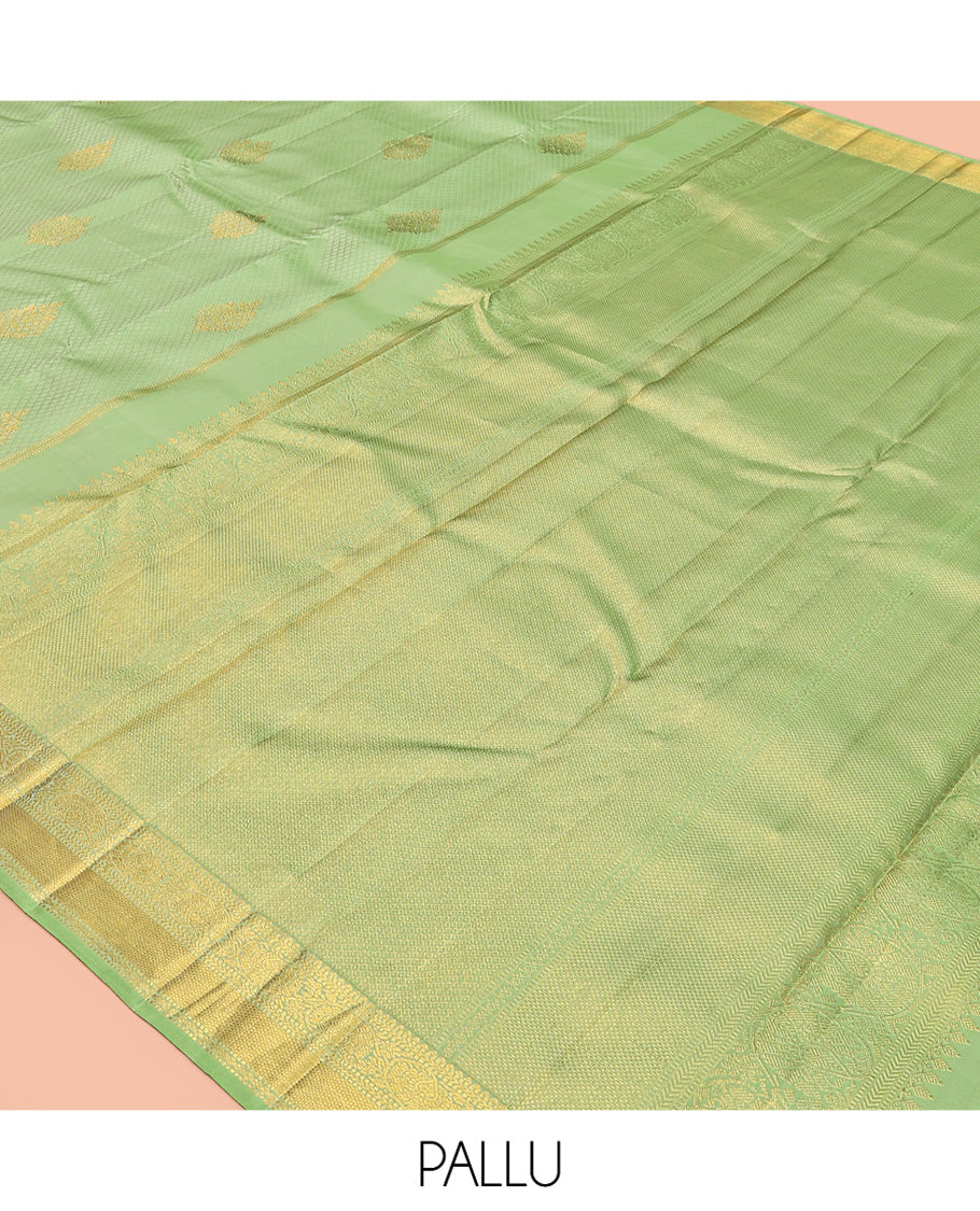 Green Embossed Parambara Silk Saree, Adorned with Zari Border of Rekku, Muthu, Kathir, Kuyil Kann, and Kodi Visiry Designs, Pallu of Mayil Kann, and Matching Blouse