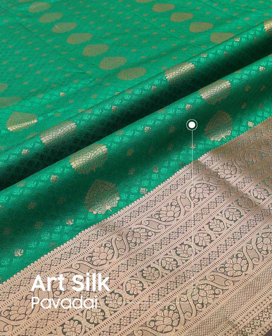 Green leaf design art silk pavadai material with contrast traditional zari design border & floral zari design blouse