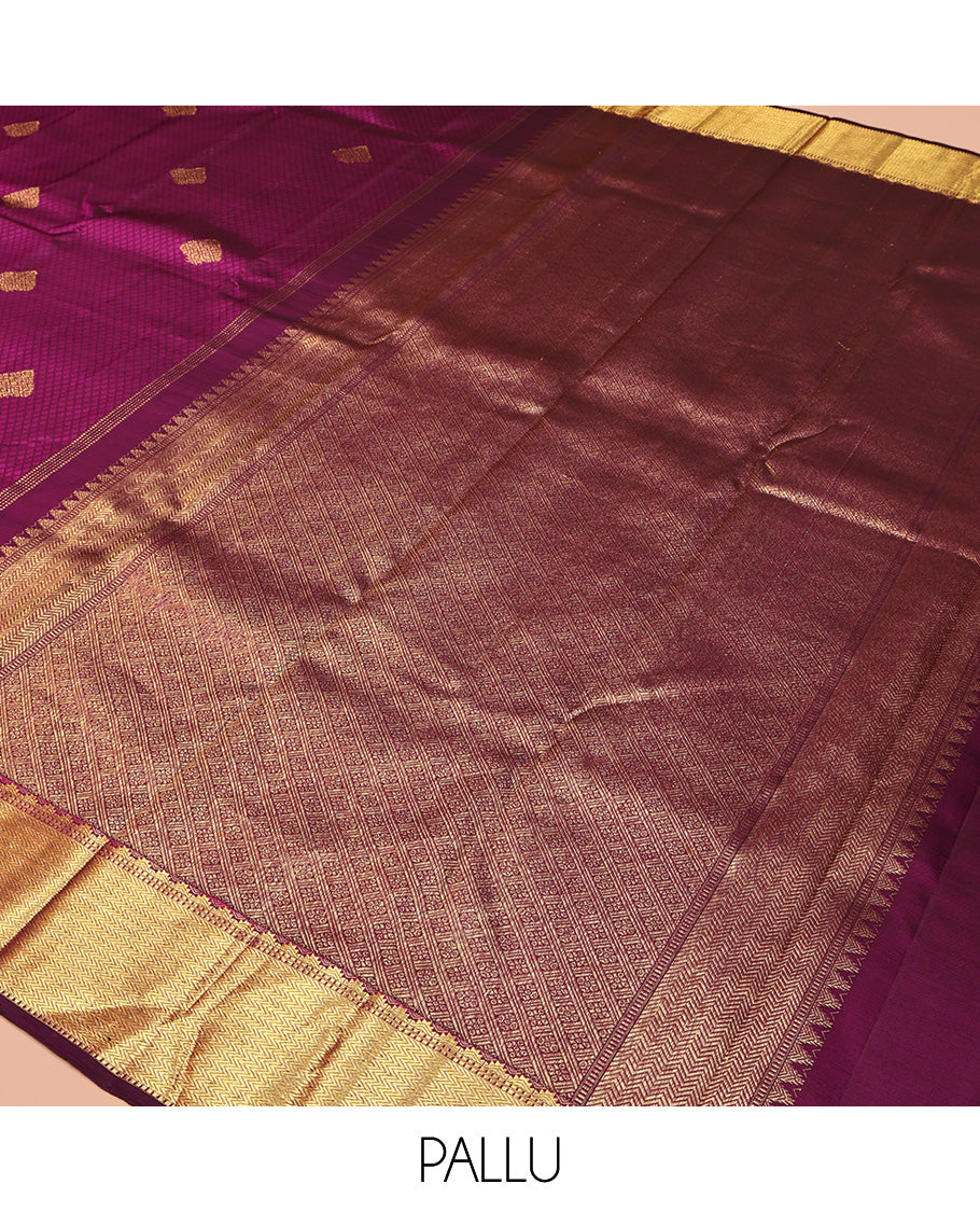 Wine Parampara Silk Saree, Enriched with Zari Buttas and Embossed Texture On Its Body, Highlighted by Zari Border of Thazampoo Rekku, Muthu, and Vanki Designs, Pallu Features Vanki Designs and Paired with a Matching Blouse
