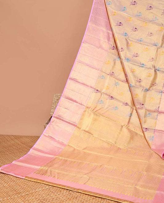Orange floral motifs tissue saree with contrast border of thilakam mokku,mayil kann, poo chakram designs & zari design pallu