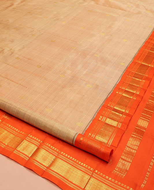 Sandal Kanchipuram Silk Saree, Graced with Zari Buttas on Its Body, Complemented by a Contrast One-Sided Korvai Border of Panner Sombu, Banaras, Muthu, and Mayil Kann Designs, Pallu Steeped with Zari Designs, and Comes Without a Blouse