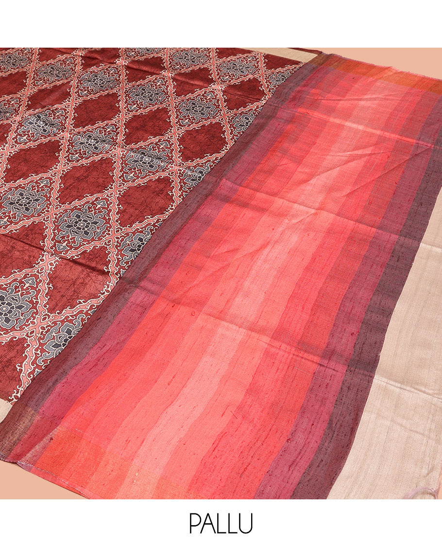 Terracotta Red Tussar Silk Saree, Boldly Accentuated with Ajrakh-Style Jaal Design on Its Body, a Subtle Border, Ombre-Style Striped Pallu, and Paired with a Contrast Blouse