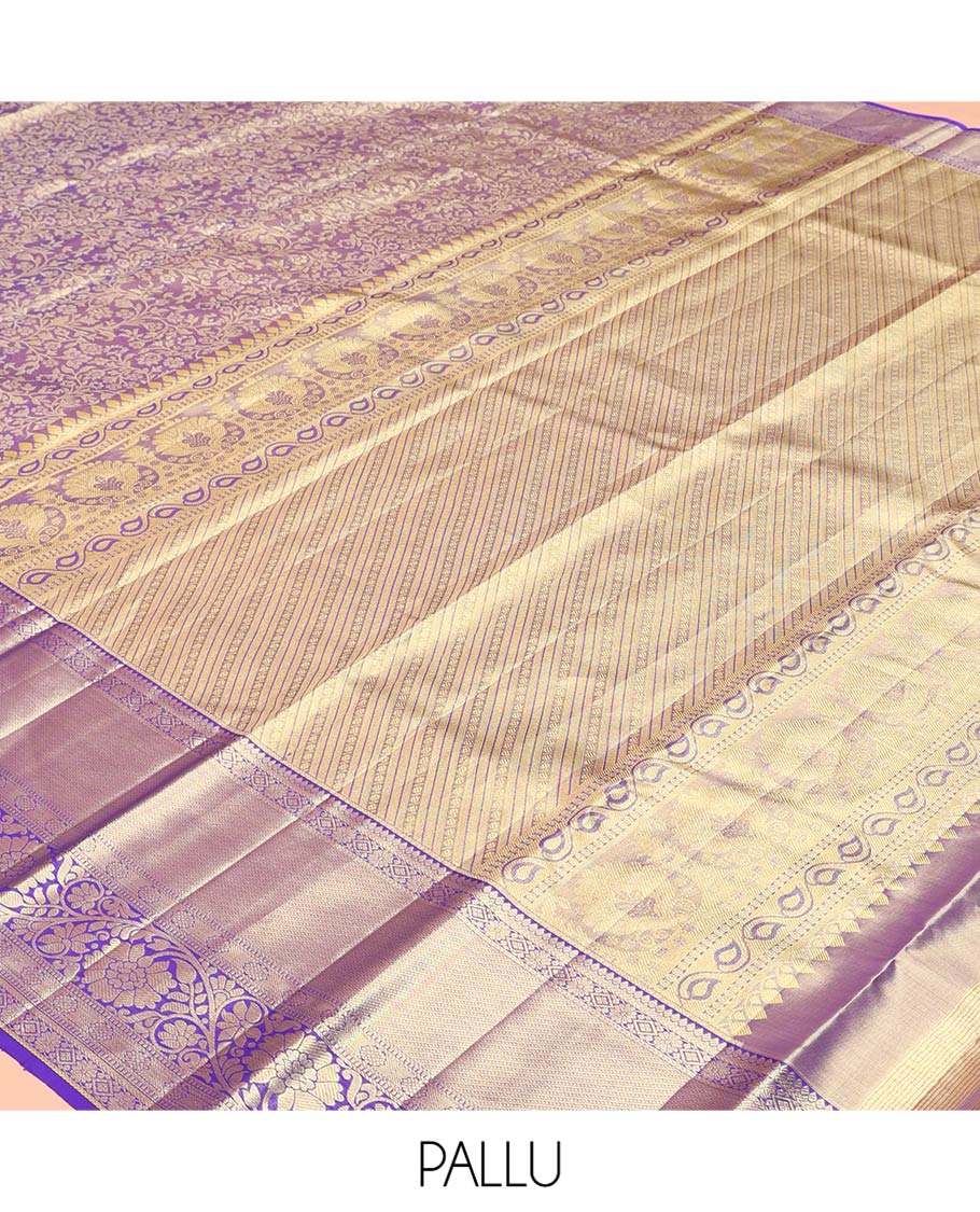 Blue Kanchipuram Tissue Silk Saree, Beautifully Bedecked with Floral Jacquard Designs on Its Body,  Complemented by a Contrast Border of Thilakam, Kamalam, Diamond, and Kodi Visiry Designs, Intricately Designed Pallu, and Paired with Matching Blouse