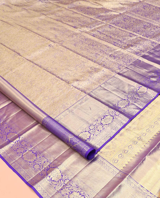 Blue Kanchipuram Tissue Silk Saree, Beautifully Bedecked with Floral Jacquard Designs on Its Body,  Complemented by a Contrast Border of Thilakam, Kamalam, Diamond, and Kodi Visiry Designs, Intricately Designed Pallu, and Paired with Matching Blouse