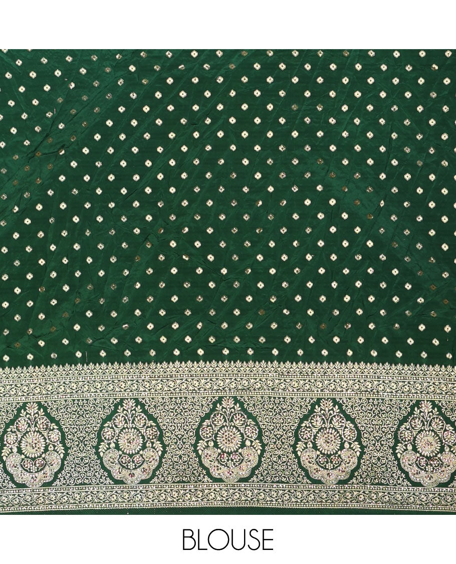 Haldi yellow chiniya crepe half-saree, chevron zari jacquard with contrast intricate patterned stone work bordered skirt, contrast blouse, and a scallop bordered intricate dhavani