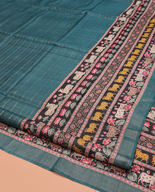 Blue Tussar Silk Saree, Sparsely Threaded with Stripes, Complemented by a Contrast Pichwai Cow-Lotus Print Border, Printed Pallu, and a Contrast Blouse