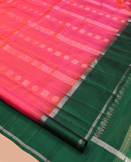 Pink Kanchipuram Silk Saree, Sparsely Woven with Buttas and Stripes, Complemented by a Contrast Bodi Border, Grand Pallu, and a Contrast Blouse
