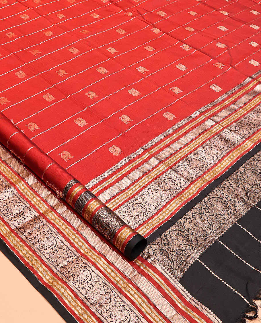 Maroon Striped-Mayil Buttas Vasundhara Silksaree, Contrast Border of Mayil Kann,Mayil, and Yaali, Jaal Pallu, and a Contrast Blouse