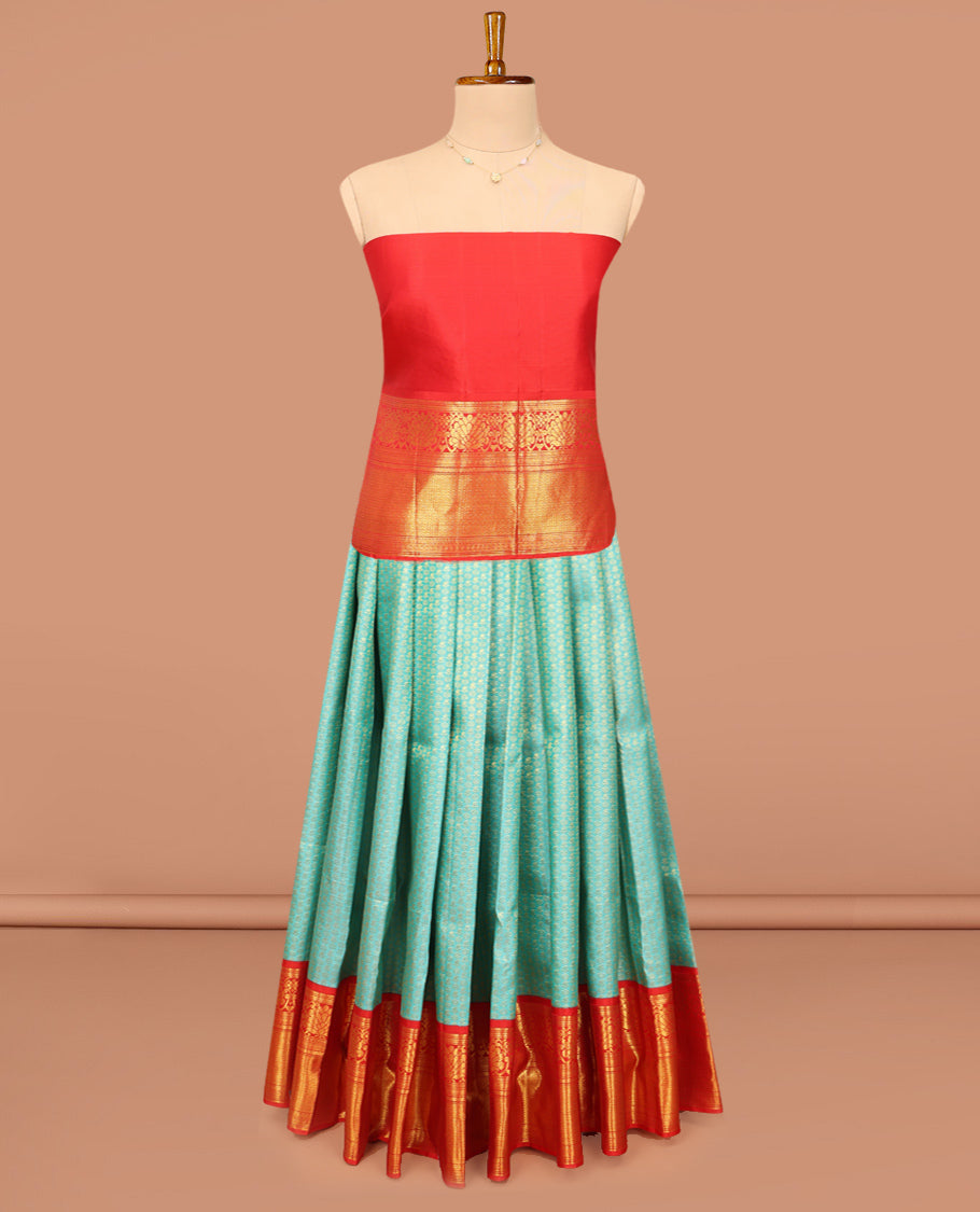 Blue Pure Silk Half-Saree, Gleamed Up with Zari Buttas on Its Skirt, Complemented by a Contrast Border Featuring Kodi Visiry, Neli, Muthu, and Jaal Designs, Comes with a Contrast Blouse and a Dhavani of Jaal Designs