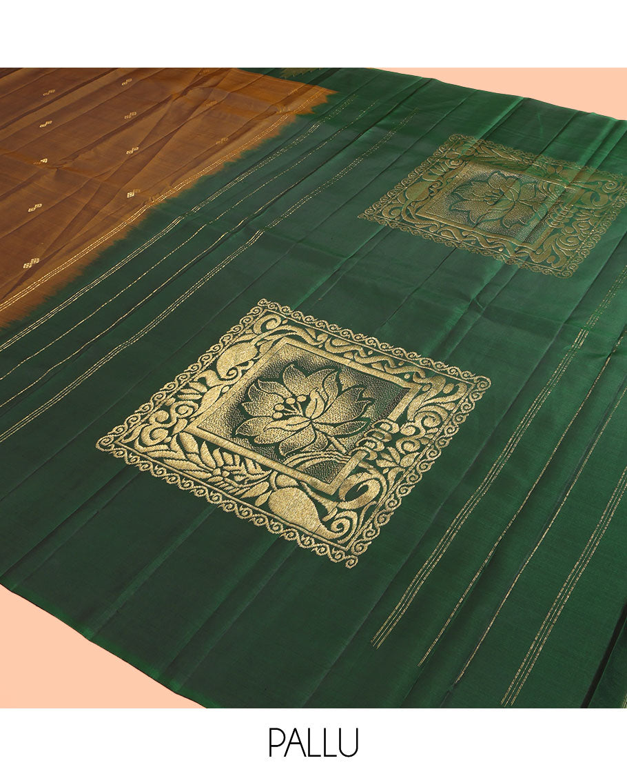 Brown Kanchipuram Silk Saree, Subtly Woven with Buttas, Complemented by a Contrast Thazampoo Rekku Border, Grand Floral Pallu, and Contrast Blouse