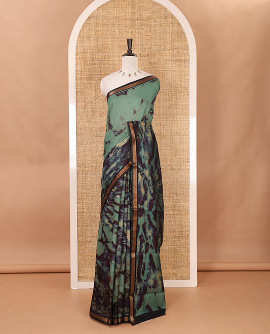 Sea blue shibori-style printed muslin saree, contrast zari piping border, self printed pallu & shibori-style printed blouse