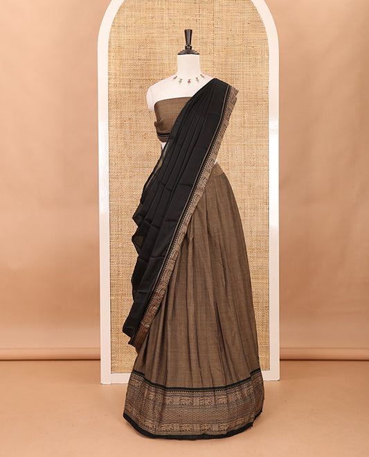 Brown with balck cotton half saree with contrast elephant design border,elephant design blouse & zari design border dhavani