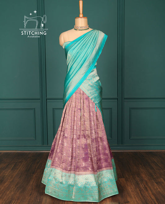 Purple jacquard art-silk half-saree, contrast traditional zari design border, stonework blouse & intricate dupatta