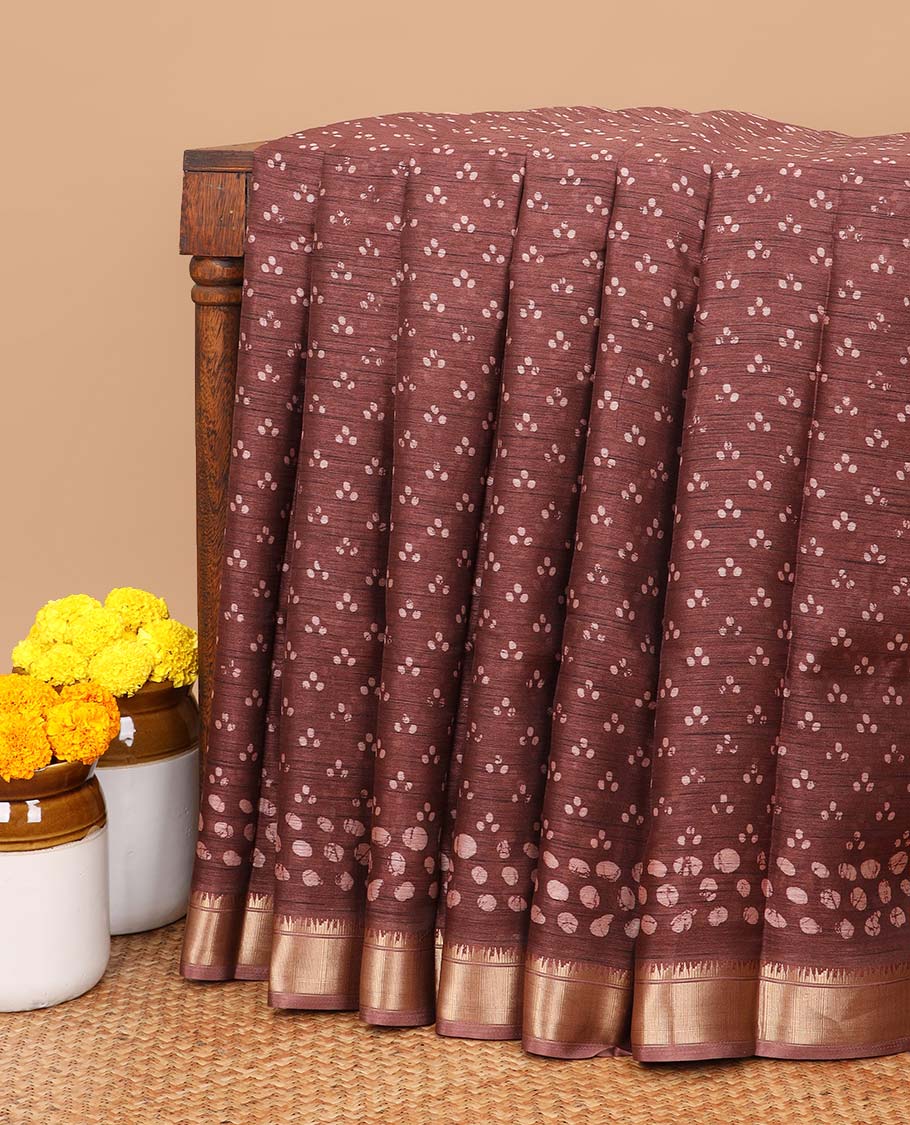 Brown all over batik printed semi-tussar saree with self zari jacquard border