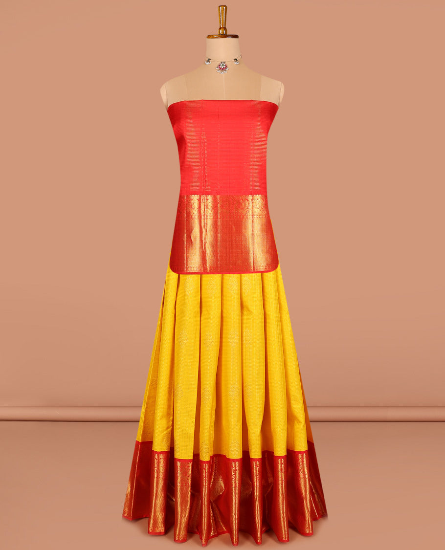 Yellow pure silk half-saree, zari design skirt, contrast korvai border of mayil, rudraksham, and mayil kann designs, and zari bordered blouse, and contrast jaal dhavani