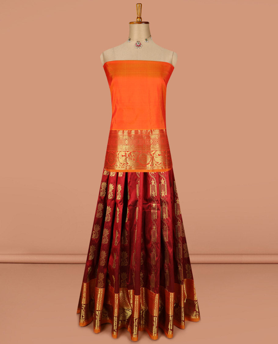 Maroon pure silk half saree, zari buttas skirt, contrast border and blouse of thilakam mokku, banaras, kathir, vanki, and mayil chakram design, and paiyaadi kattam dhavani