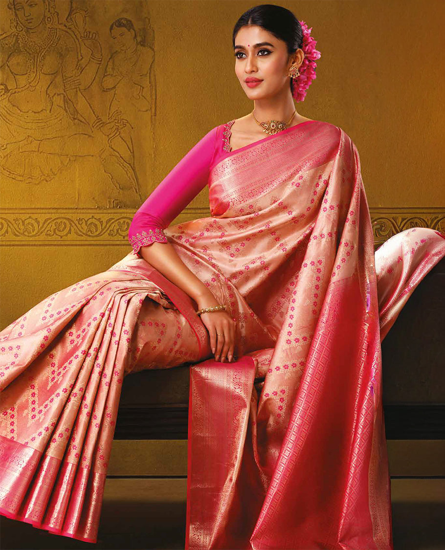 Pink floral chevron jacquard Kanchipuram wedding silk saree, contrast traditional zari design border, and jaal pallu