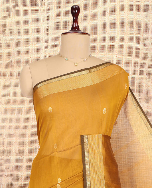 Mustard Maheshwari Cotton Saree, Adorned with Buttas, a Traditional Zari Border, Gleaming Zari Pallu, and a Matching Blouse