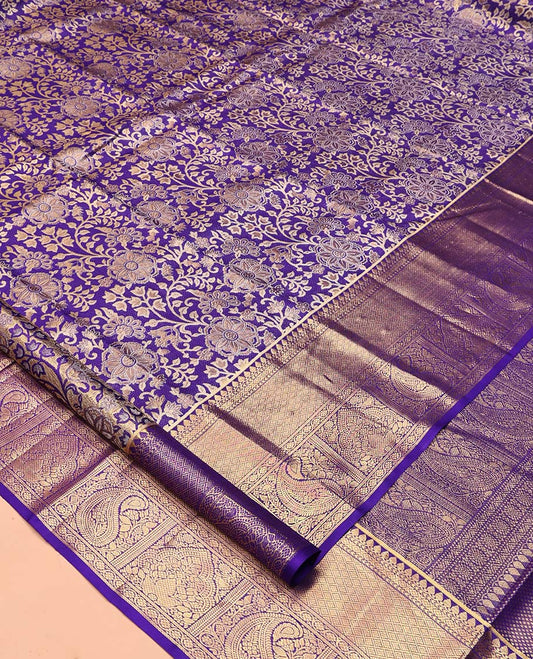 Violet Kanchipuram Tissue Silk Saree, Gracefully Embellished with Floral Jacquard, a Zari Border of Thilakam Mokku, Jaal, and Manga Designs, Diagonal Striped Pallu, and Matching Blouse