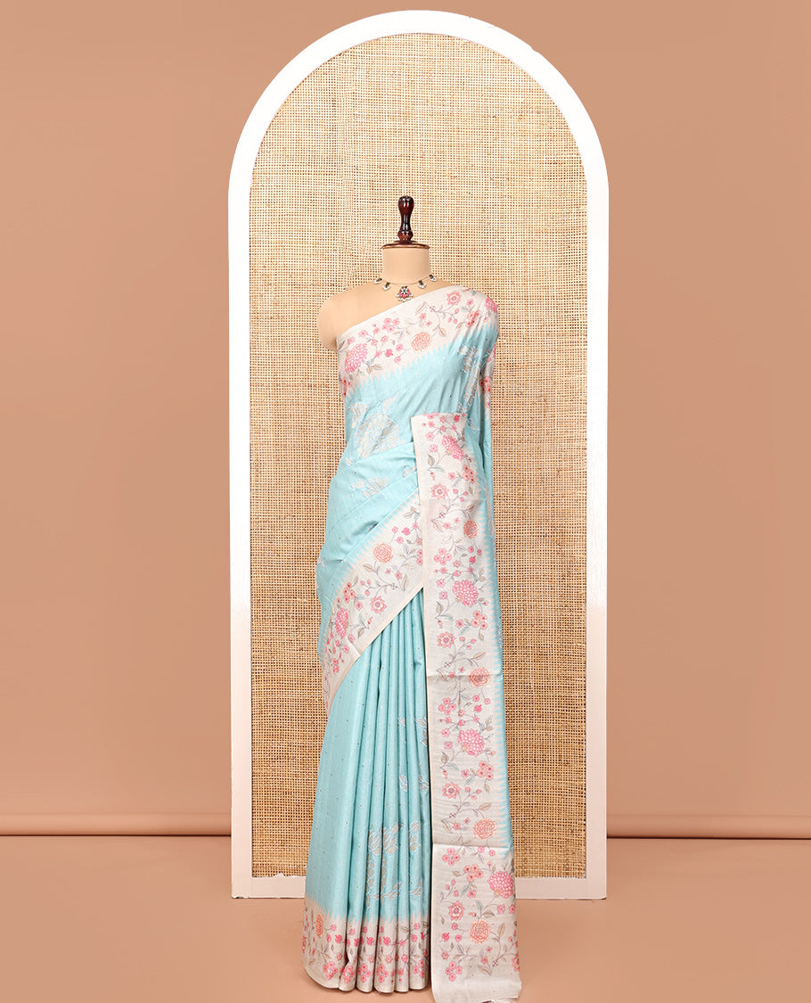 Sky Blue Fancy Tussar Silk Saree, Gleamed Up with Small Gold Buttas, and Applique Embroidery on Its Body, Complemented by a Contrast Temple Floral Creeper Printed Border, Pallu of Floral Creeper Print, and Paired with a Contrast Blouse