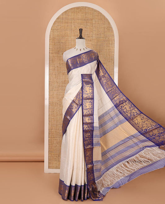 Half-white zari checked semi-taffeta silk saree, contrast deer motifs zari woven border, striped pallu & contrast striped zari border blouse