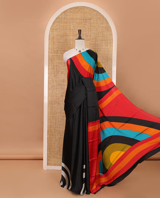 Borderless black-base kaleidoscopic-colored abstract printed satin crepe saree, rainbow-style printed pallu & matching plain blouse