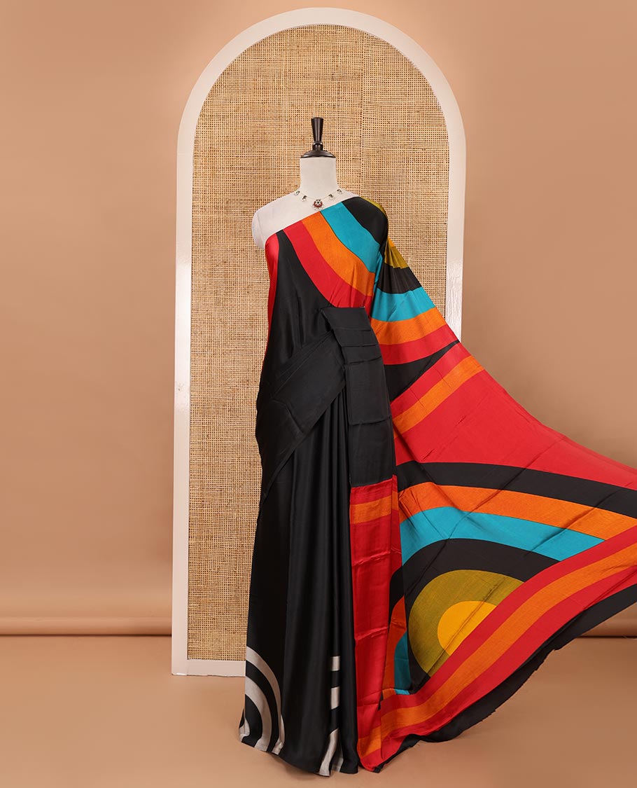 Borderless black-base kaleidoscopic-colored abstract printed satin crepe saree, rainbow-style printed pallu & matching plain blouse