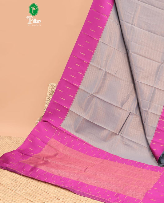 Grey copper zari brocadedesign litchi soft silk saree with contrast korvai stain , weaving buttas border & contrast weaving rich pallu along with copper zari, small buttas blouse