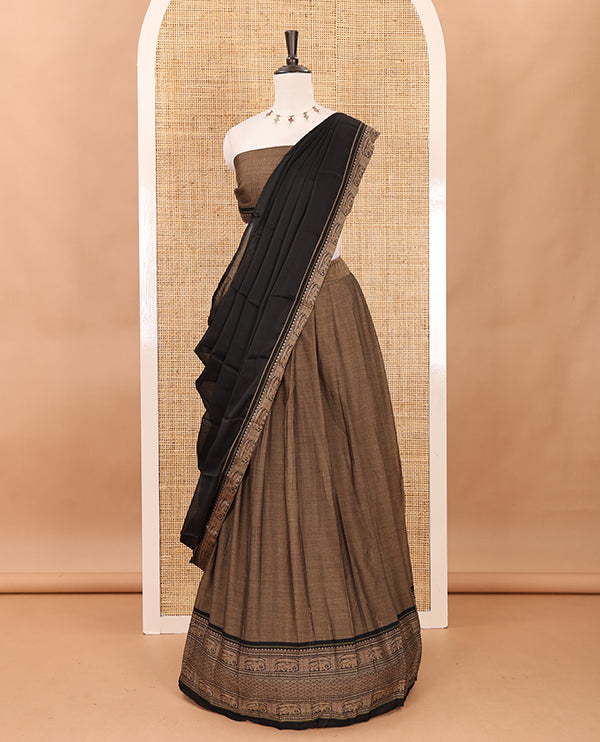 Brown with balck cotton half saree with contrast elephant design border,elephant design blouse & zari design border dhavani