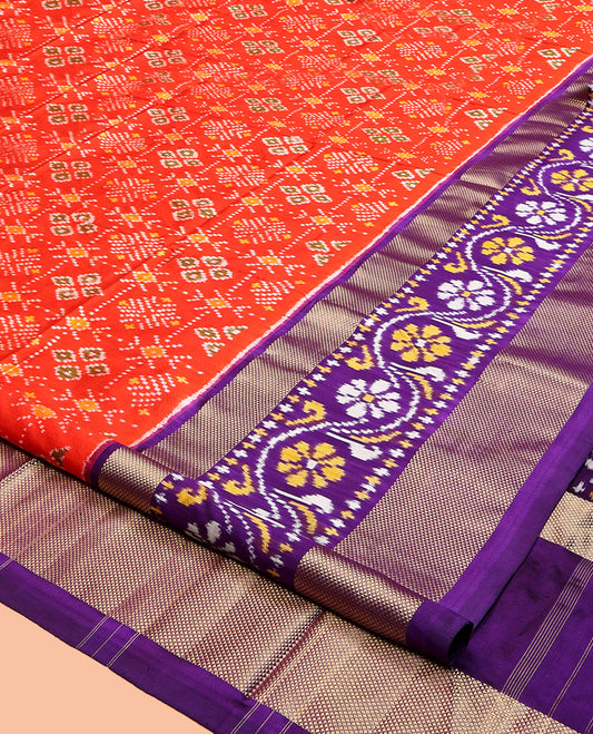 Orange Pochampally Ikat Silk Saree, Accentuated with Intricate Designs, a Contrast Border of Floral Creeper and Peacock-Eye Designs, Floral Creeper Pallu, and a Contrast Blouse