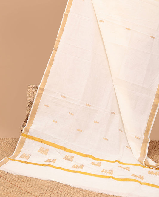 Cream kerala saree, zari border & pallu of peacock zari designs