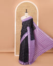 Deep purple zari checked sungudi cotton saree, contrast lavender border of zari peacock motifs & checked peacock motif lavender blouse