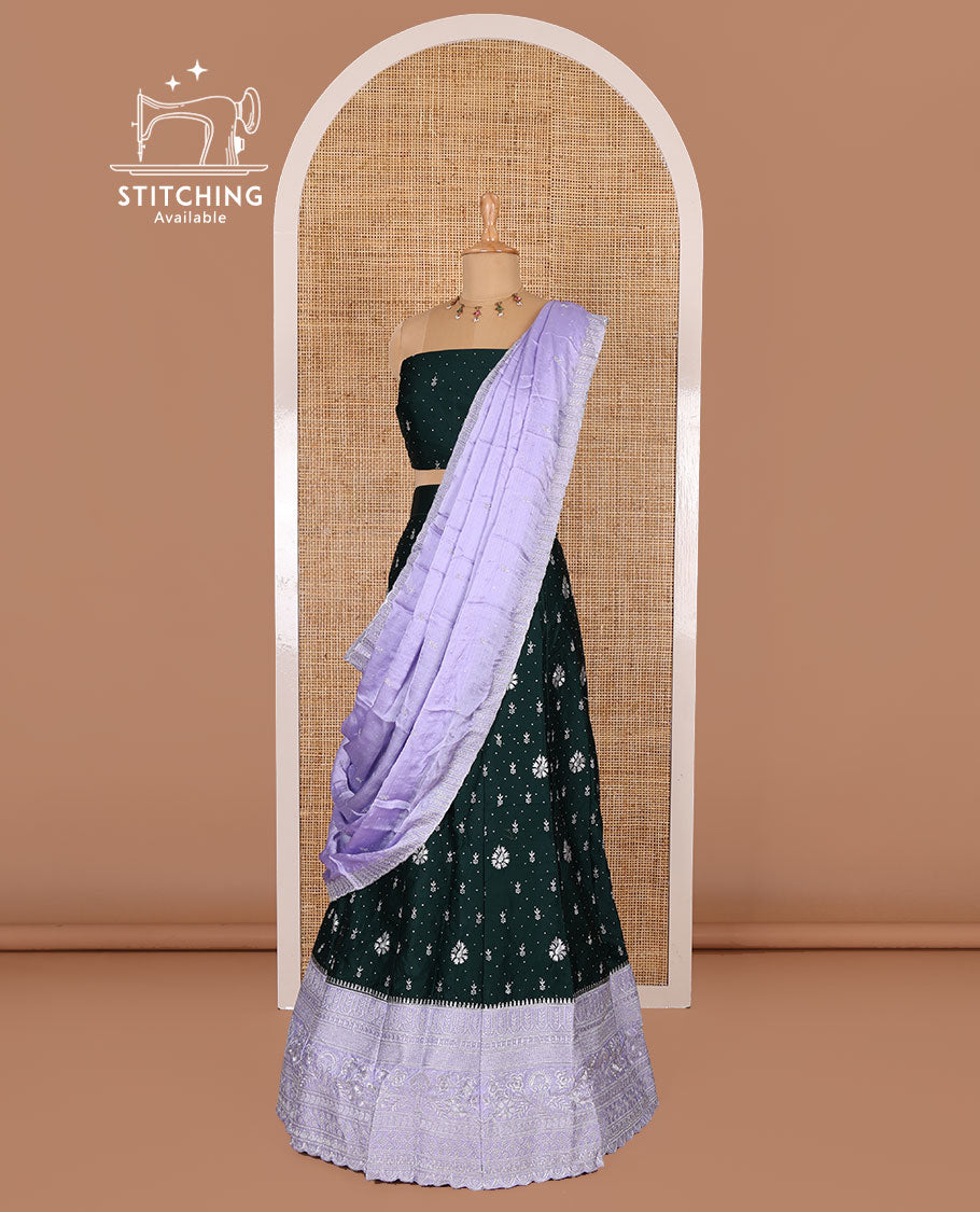 Dark Green half-saree, floral motifs embroidered semi raw silk top, matching embroidered blouse, and contrast scallop embroidered georgette dhavani