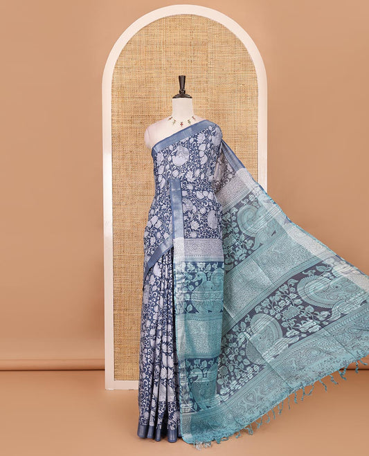 Navy blue flora-fauna kalamkari printed Bhagalpur linen saree, zari border, contrast floral-peacock printed pallu & contrast printed blouse