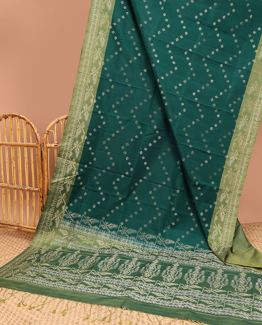 Green zari buttas soft silk saree, contrast border & pallu of patola-style intricate design weave