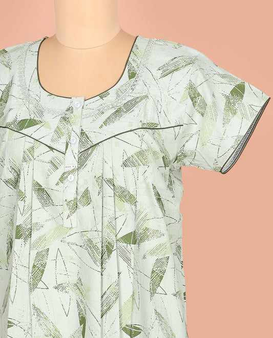 Pale Green Cotton Nighty Adorned with Geometric Patterns Print, Featuring Neck Lace Work, Round Front Neck, and Half-Sleeves
