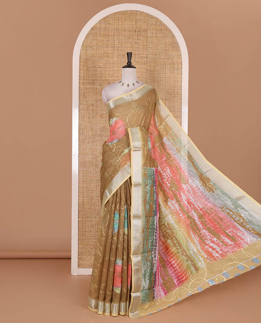 Mustard shibori printed with thread floral vine embroidered linen cotton saree, contrast bavanji border, pallu, and blouse of shibori print with embroidery