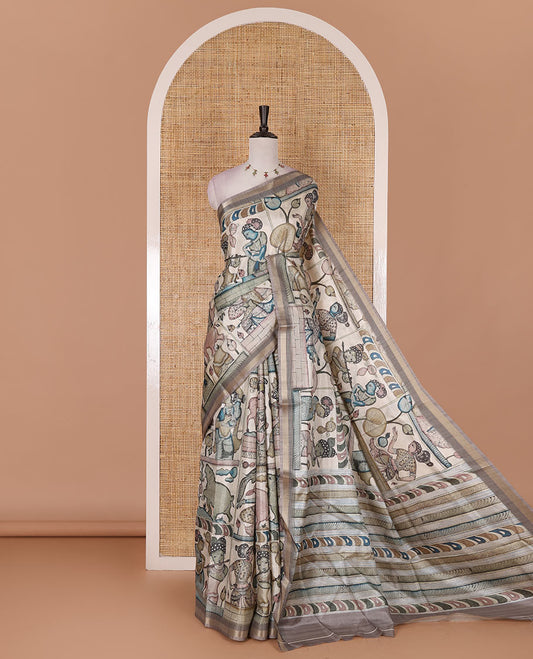 Chikku kalamkari ancient human figurines and animal motifs printed semi-tussar saree, gold zari piping border, printed pallu, and contrast printed blouse