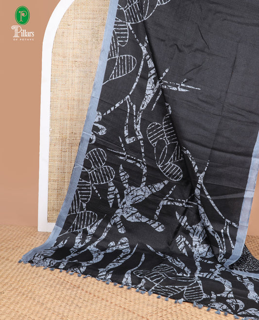 Black with grey geomentrical design khadhi silk saree with contrast striped border & geomentrical print pallu along with printed blouse