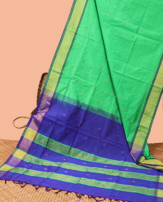 Green kupadam cotton saree with flower buttas, contrast plain border & pallu of stripes