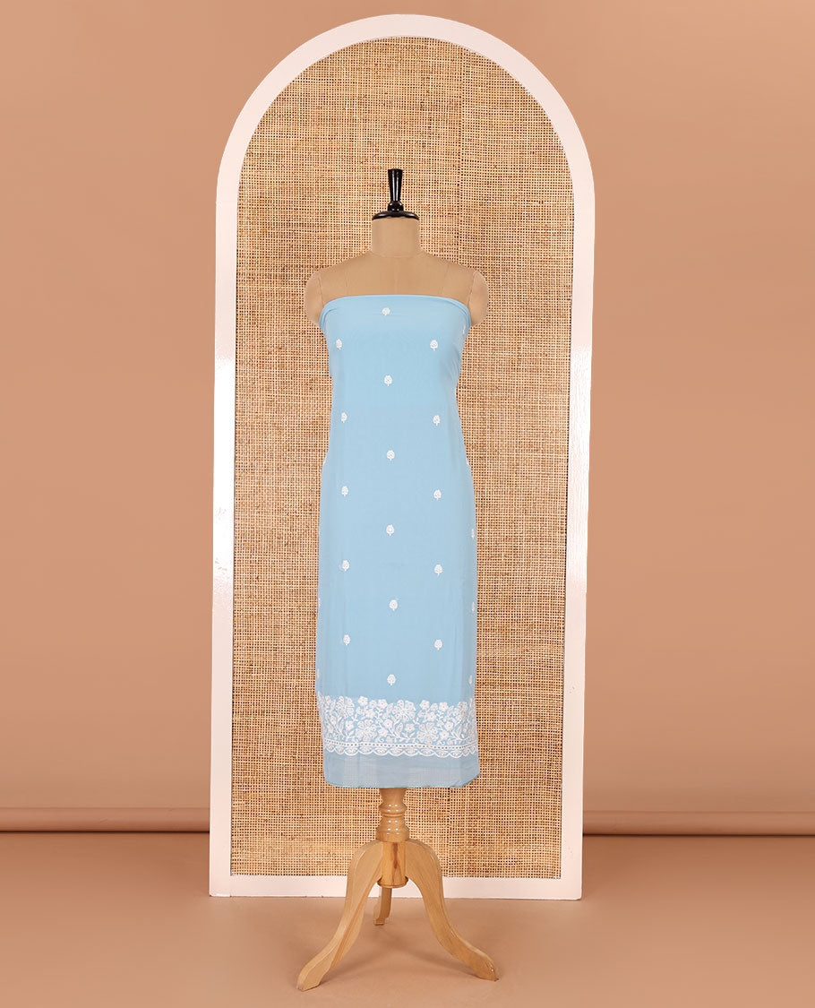 Blue material chudidar set, floral thread embroidered georgette top, plain bottom, and floral motifs embroidered scallop georgette dupatta