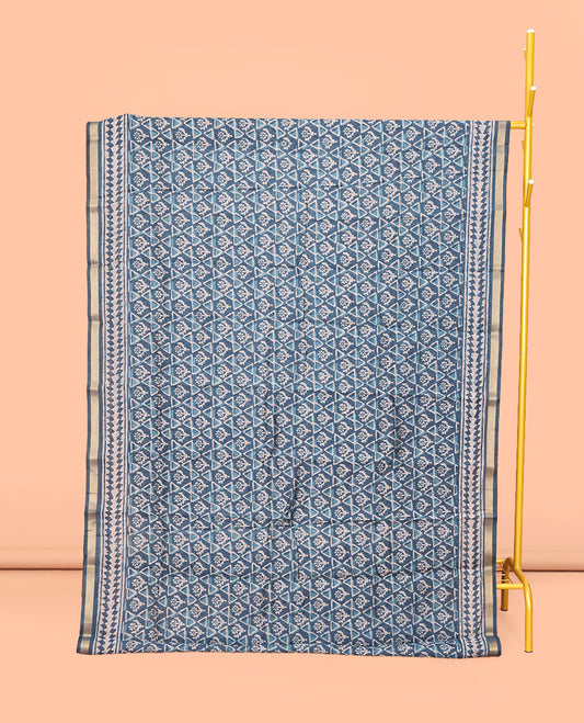 Blue Mul Mul Cotton Saree, Adorned with Floral-Geometric Batik Print, a Subtle Border, a Batik-Printed Pallu, and a Contrast Blouse