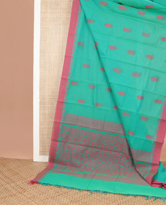 Sea green floral motifs kanchi cotton saree with contrast plain norder & floral design pallu