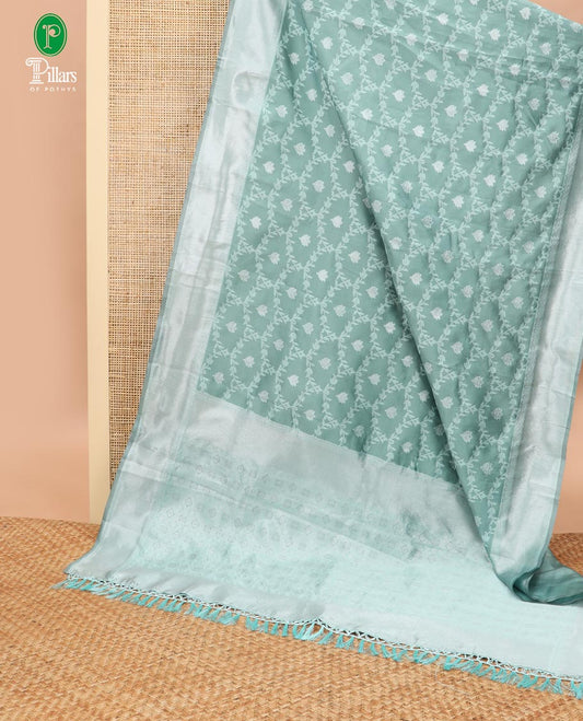 Light green  jaal design litchi soft silk saree with silver weaving border & silver zari rich pallu along with butta design blouse